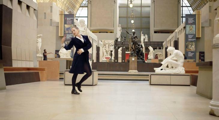 Person walking through a museum