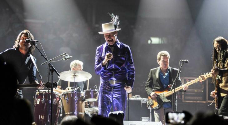 The Tragically Hip performing on stage