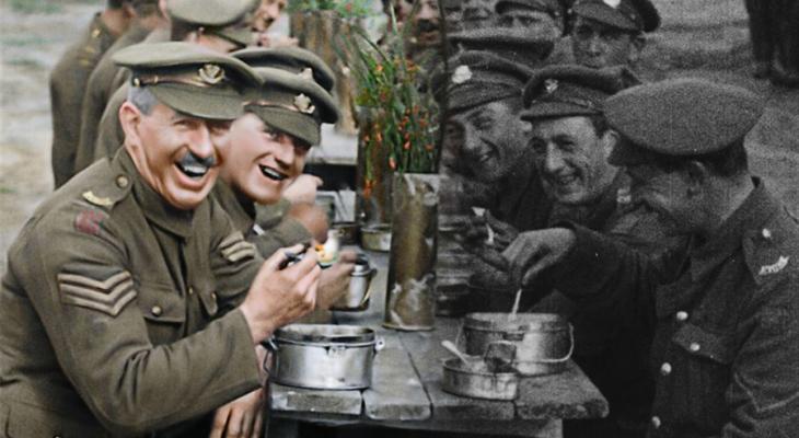 Soldiers sitting and eating together