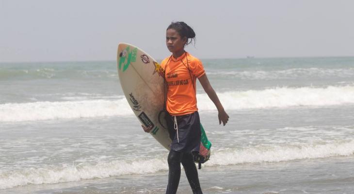 a person with a surfboard