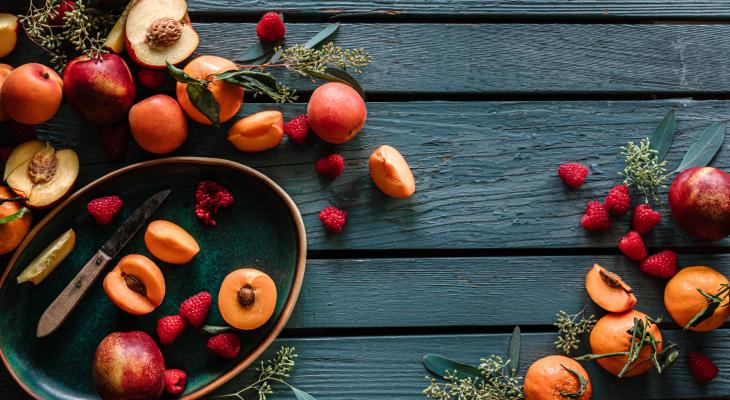 A spread of cut up stone fruits