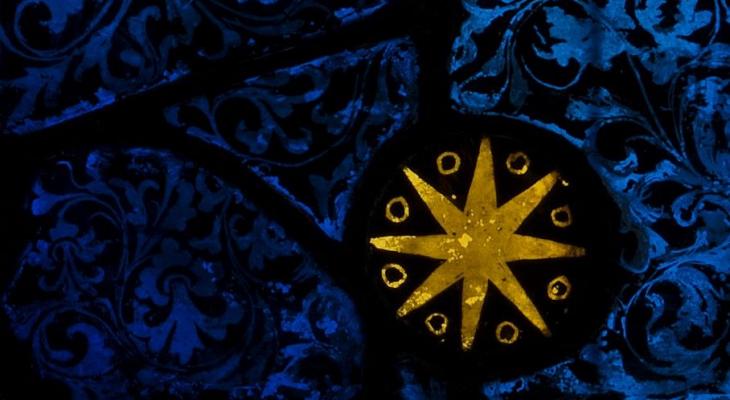 A yellow star on a blue background