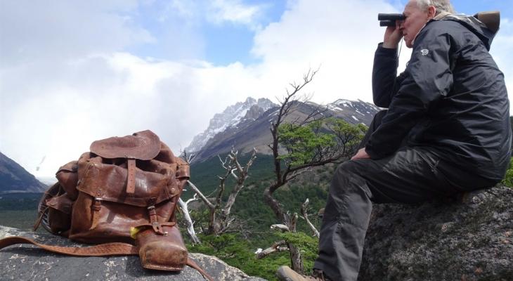 Person looking with binoculars