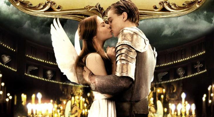a teenage girl with angel wings and boy kissing in a suit of armour