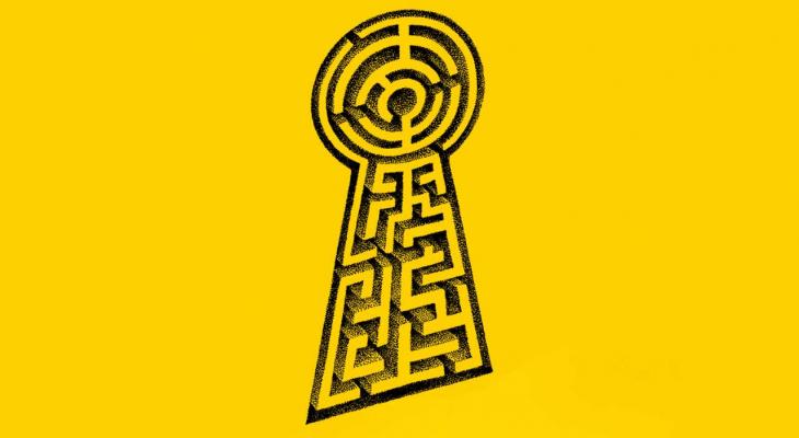 a keyhole with a hedge maze inside