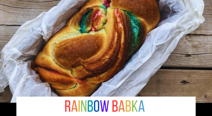 a freshly baked babka woven with rainbow colours baked into it with the title "rainbow babka" written in rainbow coloured letters and below it: bake-a-long with shauna godfrey