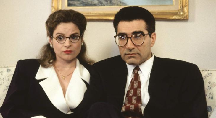 Linda Kash and Eugene Levy observe something questionable offscreen.