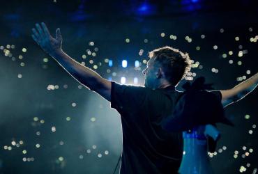 Damon Albarn on stage performing with Blur