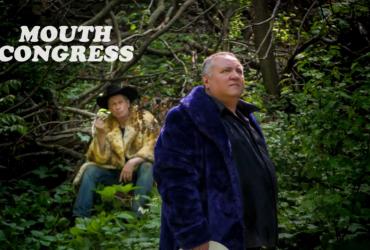 Scott Thompson and Paul Bellini together in the woods