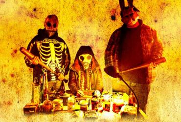 three people in masks holding baseball bats