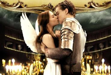 a teenage girl with angel wings and boy kissing in a suit of armour