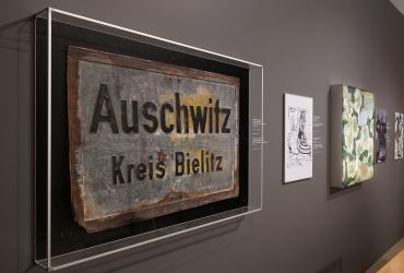 Street sign directing to Auschwitz