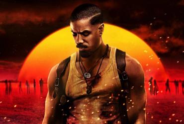 a man standing in front of a sunrise with a row of shadowy figures