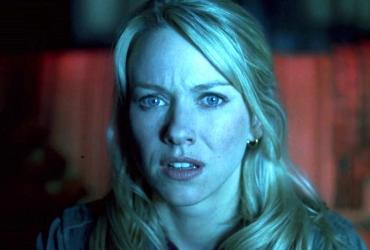 Naomi Watts looking terrified while watching a cursed videotape