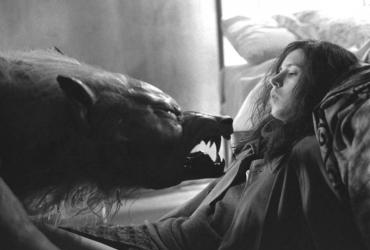 A woman is threatened by a werewolf.