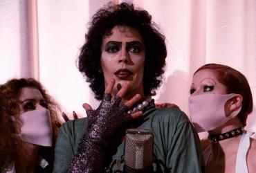 Dr. Frank-n-Furter flanked by Magenta and Columbia.