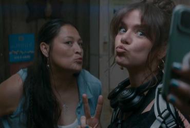 Two women take a selfie.