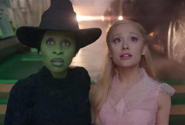 Young Elphaba and Glinda gazing in wonder.
