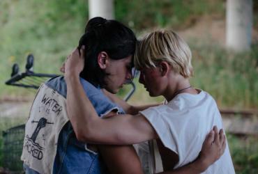 Two teens share an intimate moment.
